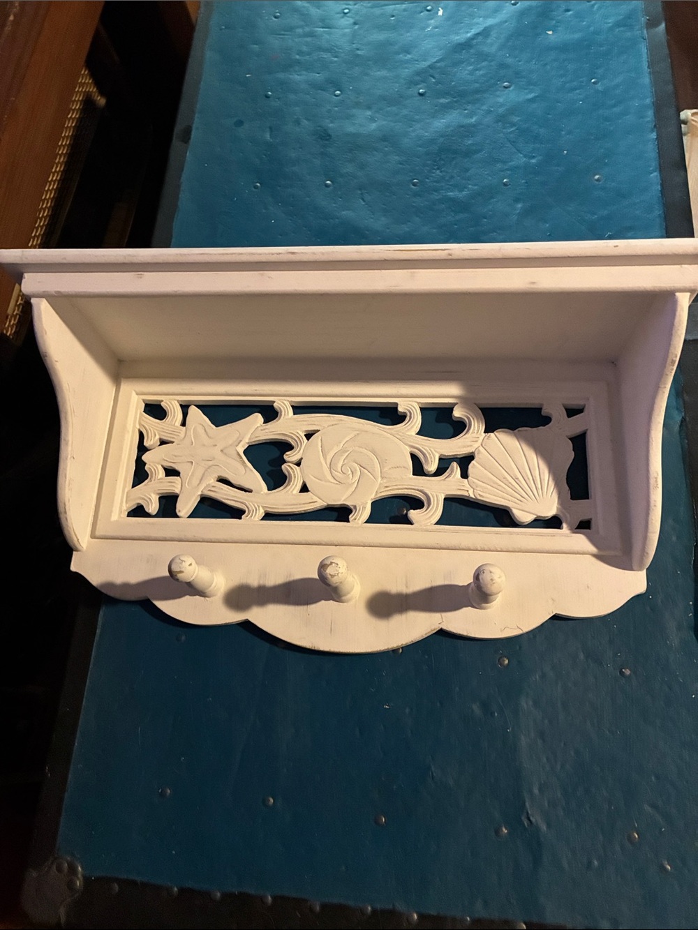 Coastal White Wall Shelf with Carved Sea Motif and Hooks
